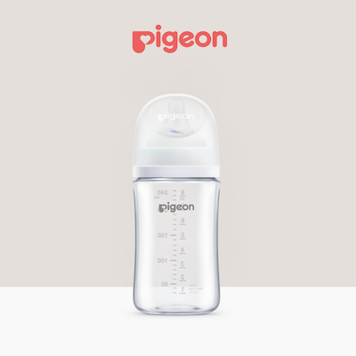 Pigeon BPA-free feeding bottle with measurement markings, suitable for Malaysian parents switching from breastfeeding to bottle.